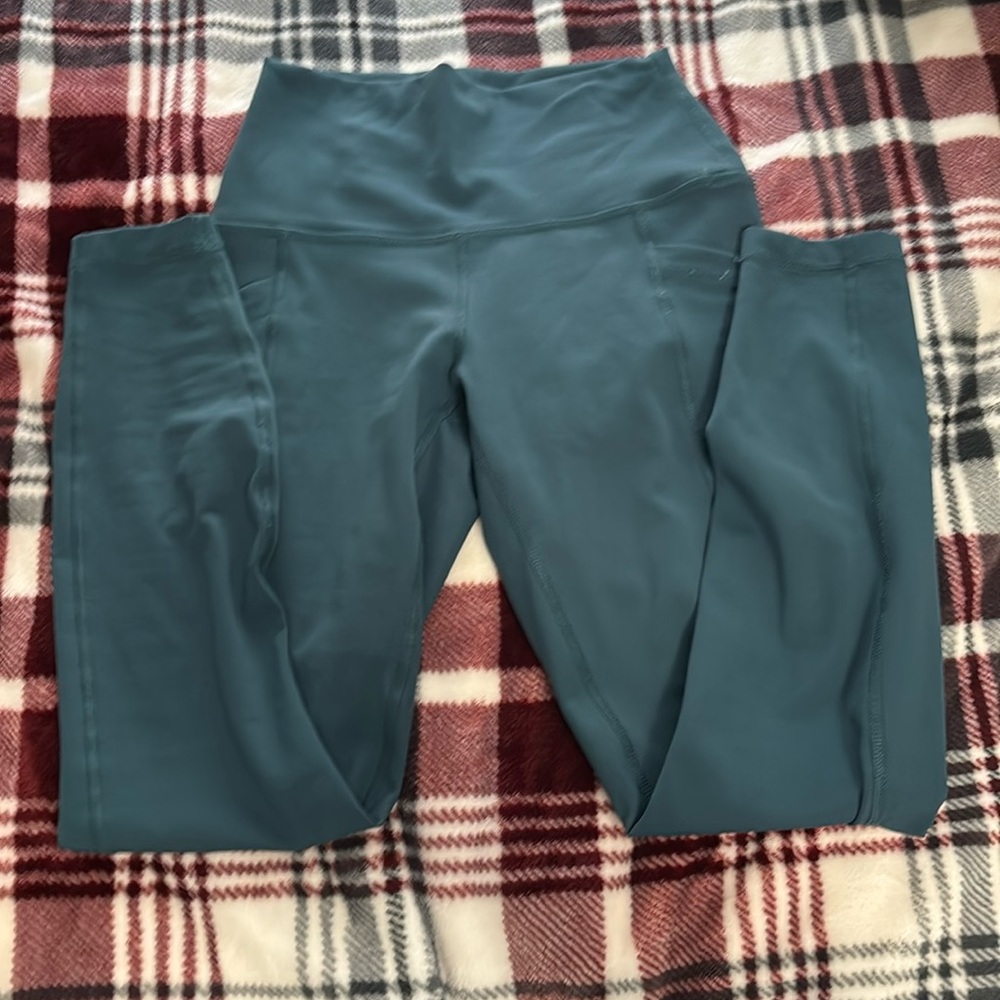 Selling Reflex leggings in XS. Color is tealish barely worn in perfect condition